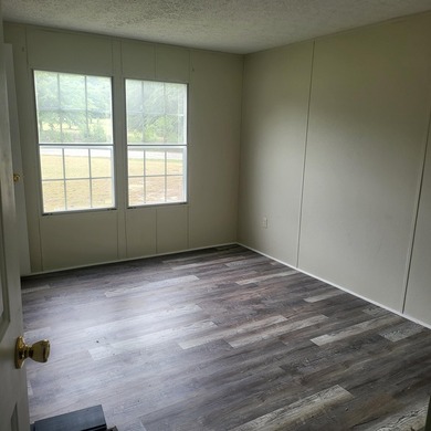 Welcome to this 1,900-square-foot mobile home situated on 5 - photo 19