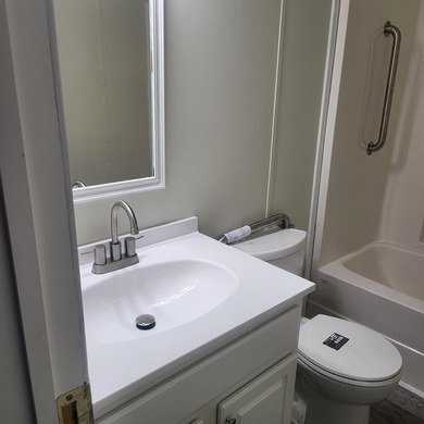 Welcome to this 1,900-square-foot mobile home situated on 5 - photo 20