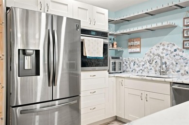 Perfectly capturing the charm of a Key West-style bungalow while - photo 21