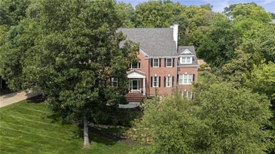 Welcome to this custom-built colonial home in the prestigious