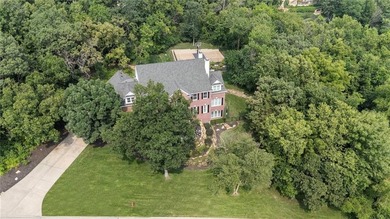 Welcome to this custom-built colonial home in the prestigious