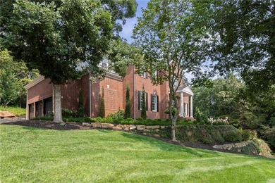 Welcome to this custom-built colonial home in the prestigious