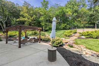 Welcome to this custom-built colonial home in the prestigious