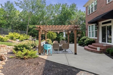 Welcome to this custom-built colonial home in the prestigious