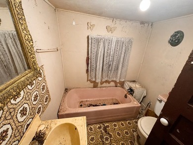 Opportunity is knocking at this 2-bedroom, 1-bath home built in - photo 12