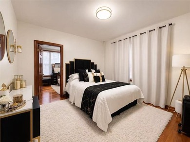 Welcome to this spacious and well maintained 2-family brick home - photo 5