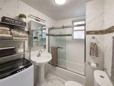 Welcome to this spacious and well maintained 2-family brick home - photo 8