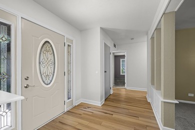 Step into this easy living U shaped ranch in truly one of the - photo 3