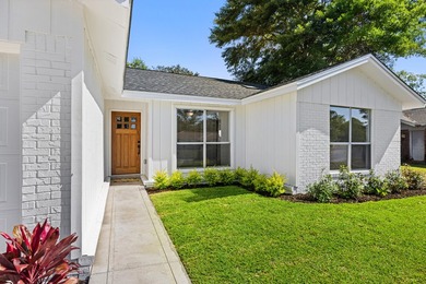 Consider stepping into this beautifully refreshed home just in - photo 3
