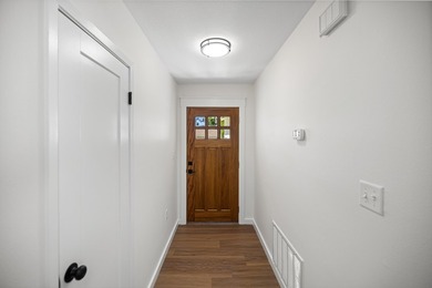 Consider stepping into this beautifully refreshed home just in - photo 5