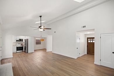Consider stepping into this beautifully refreshed home just in - photo 7