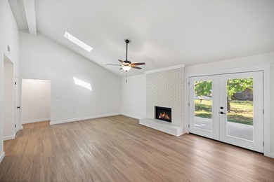 Consider stepping into this beautifully refreshed home just in - photo 8