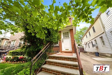 Welcome to 1073 East 3rd Street, a one family brick home sitting - photo 2