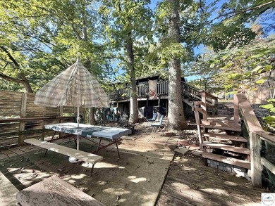 Discover the potential of this quaint two-bedroom cabin, nestled - photo 8