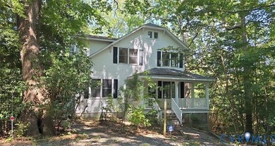 Great potential in this 7.6 acre rural waterfront retreat in the - photo 1