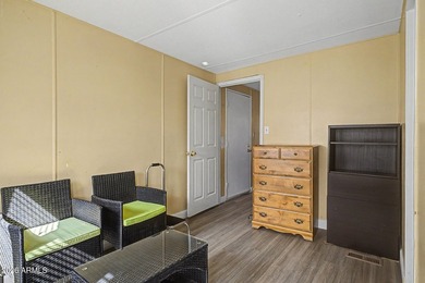 Welcome home! This charming 3-bedroom, 2-bath mobile home greets - photo 26