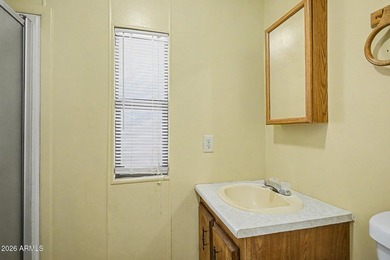 Welcome home! This charming 3-bedroom, 2-bath mobile home greets - photo 27