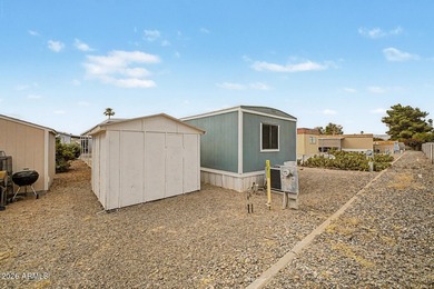 Welcome home! This charming 3-bedroom, 2-bath mobile home greets - photo 29