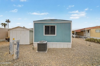 Welcome home! This charming 3-bedroom, 2-bath mobile home greets - photo 30