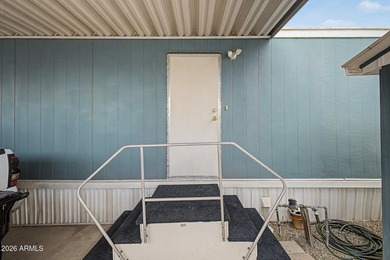 Welcome home! This charming 3-bedroom, 2-bath mobile home greets - photo 32