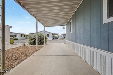Welcome home! This charming 3-bedroom, 2-bath mobile home greets - photo 33
