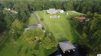 Nestled on a hilltop, this stunning lake home offers expansive - photo 40