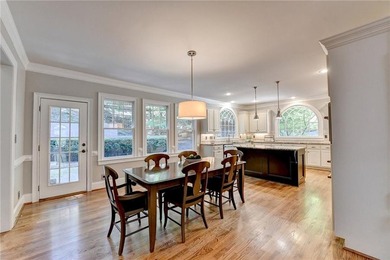 This beautifully updated brick traditional home is in the - photo 6