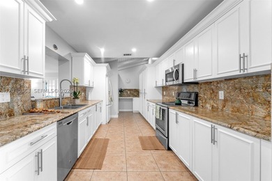 Nestled on a quiet street in one of East Kendall's most - photo 12