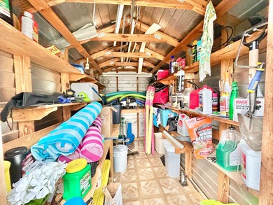 This mobile home is located in a peaceful 55+ community and - photo 12
