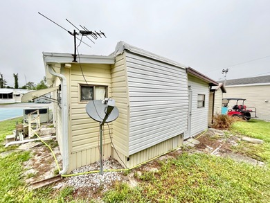This mobile home is located in a peaceful 55+ community and - photo 15