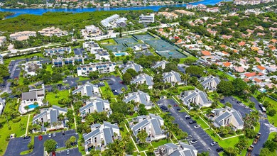 Just a 5-minute walk to Jupiter Beach, this 2-bedroom, 2 bath - photo 20