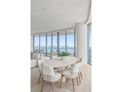 Occupying half of the 34th floor at UNA Residences, this - photo 34