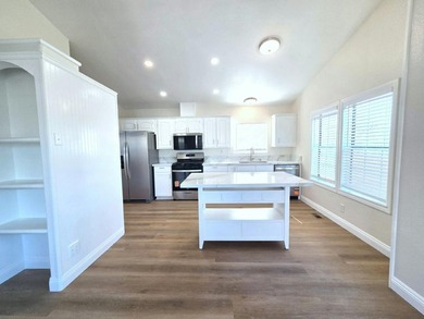 Discover affordable coastal living in this spacious 3-bedroom - photo 3