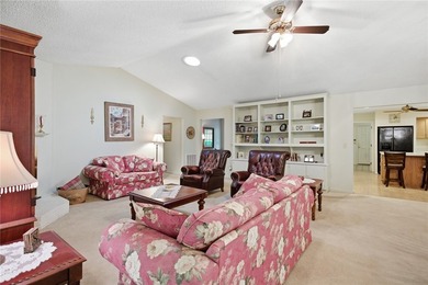 Discover the ease of main-level living with golf course views in - photo 4