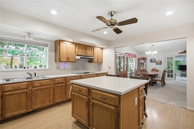 Discover the ease of main-level living with golf course views in - photo 6