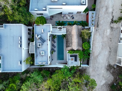 Tucked away in the lush greenery of Tulum's desirable Region 15 - photo 22