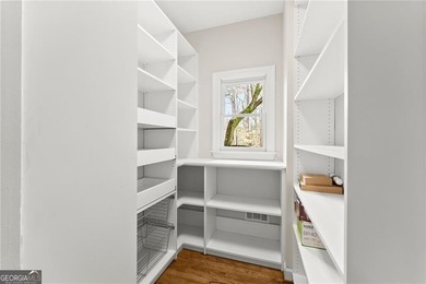 Welcome to this exceptional 6-bedroom, 4-bathroom home in the - photo 3