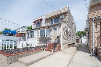 Welcome to 198-15 33rd Ave, a charming single-family home tucked - photo 3