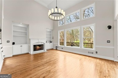 Welcome to this exceptional 6-bedroom, 4-bathroom home in the - photo 4