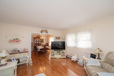 Welcome to 198-15 33rd Ave, a charming single-family home tucked - photo 5