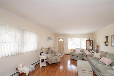 Welcome to 198-15 33rd Ave, a charming single-family home tucked - photo 6
