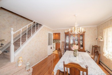 Welcome to 198-15 33rd Ave, a charming single-family home tucked - photo 9