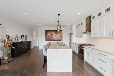 Sun-drenched penthouse offering 3 bedrooms, 2 baths, and an - photo 12