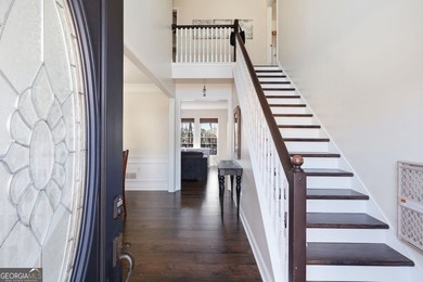 Beautiful brick front 4 bedroom, 4 full bathroom home featuring