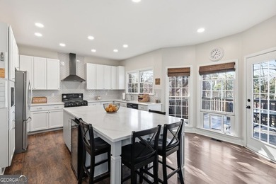 Beautiful brick front 4 bedroom, 4 full bathroom home featuring