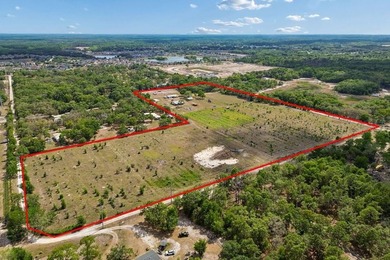 Discover a rare 27-acre opportunity in Hudson, FL, spanning two - photo 3