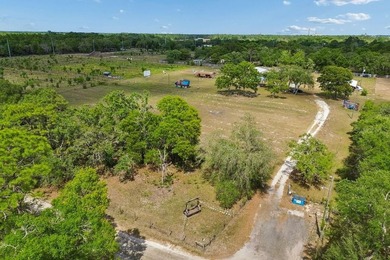 Discover a rare 27-acre opportunity in Hudson, FL, spanning two - photo 4