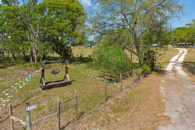 Discover a rare 27-acre opportunity in Hudson, FL, spanning two - photo 6
