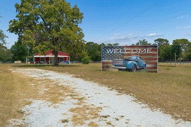 Discover a rare 27-acre opportunity in Hudson, FL, spanning two - photo 7