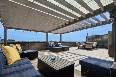 Sun-drenched penthouse offering 3 bedrooms, 2 baths, and an - photo 33